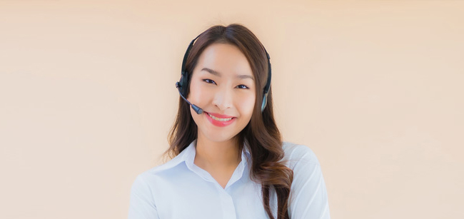 Portrait young Asian business woman with headphone customer care support