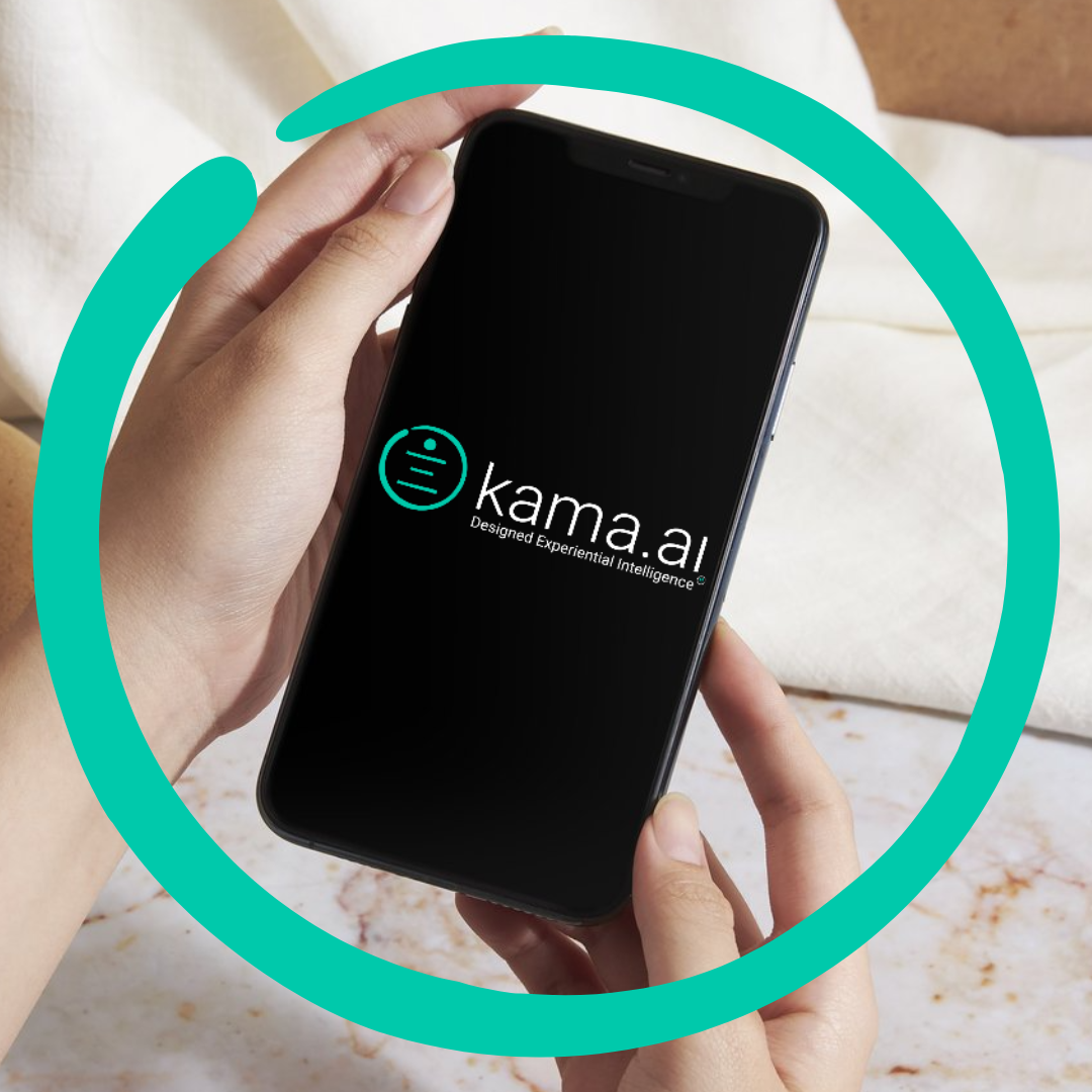 a person holding a phone, with the kama.ai logo